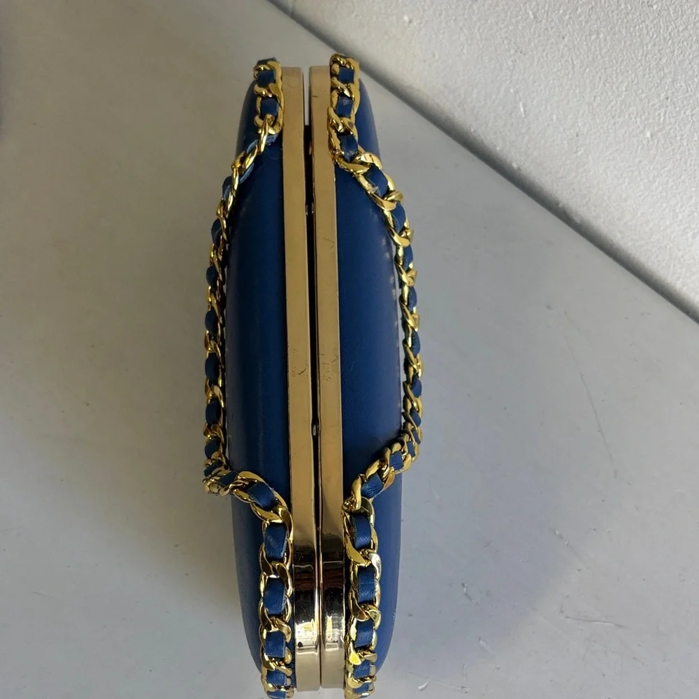 Chic Blue Pill Clutch with Gold Chain Accent